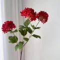 Close-up of three-head red artificial snowball flowers for home and wedding decoration. - Red