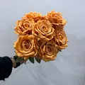 Close-up of a vibrant 9-head orange silk rose bouquet for home and hotel decoration - 9 Heads Bouquet / Orange