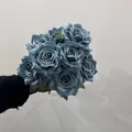 Close-up view of a 9-head dusty blue artificial rose bouquet for home and hotel decoration - 9 Heads Bouquet / Fog Blue