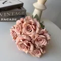 Detail view of a 7-head bouquet of artificial dusty pink diamond roses for home decor. - Light Brown