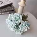 Macro detail of 7-head artificial mint blue roses for home and wedding decor. - Light Blue