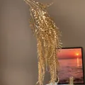 Élégante branche d'eucalyptus artificielle dorée pour la décoration du Nouvel An - Branche à feuilles tombantes dorée (N° 18)
