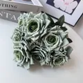 Close-up detail of artificial dusty green rose bouquet with realistic petal textures. - Green