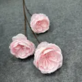 Close-up detail of multi-layered light pink artificial roses with brown stems. - Long Stem 3-Head Austin Rose