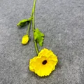Close-up of a yellow artificial poppy flower with realistic petal texture and bud. - High Branch PU Poppy