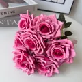 Macro view of 7-head pink artificial rose bouquet with realistic silk petals - Rose Red