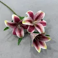 Detailed view of artificial pink lilies with realistic speckled petals and green stem - 3-Head Lily
