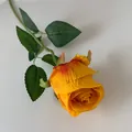 Lifelike single stem artificial Bulgarian rose in yellow and orange for home decor - Orange