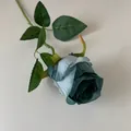 Single stem artificial Bulgarian rose in elegant teal blue for home decor - Aqua