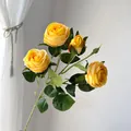Vibrant yellow artificial roses with green leaves in Monet garden style - 4-Head Rose