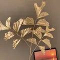 Branche de feuilles artificielles dorées pour compositions florales de fête élégantes - Style de feuille à longues branches / Or N° 69