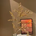 Élégante branche d'eucalyptus artificielle dorée pour compositions florales festives - Feuille d'Eucalyptus Dorée (N° 84)