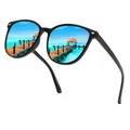 Black frame photochromic polarized sunglasses featuring a scenic beach reflection - Polarized / Black Frame Ice Blue Film Lens