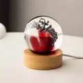 Detailed view of crystal ball night light featuring an intricate dragon figurine - Black Dragon Crystal (Plug-in)