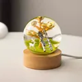 Macro view of creative resin crystal ball night light with golden tree and deer - Rising High Elk (Plug-in)