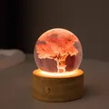 Luminous resin crystal ball night light featuring a pink tree and white deer on a wooden base - Pink Tree Elk (Rechargeable)