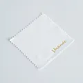 Square white microfiber jewelry cleaning cloth with gold Vinknde logo and serrated edges - 8x8cm / White