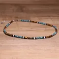 Close-up detail of handmade 2x4mm tiger eye and turquoise stone bead choker necklace - Choker Necklace