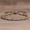 Handmade natural stone beaded bracelet with gold spacers and adjustable brown cord - Green Garnet