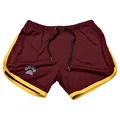 Front view of maroon mesh athletic shorts with yellow trim and paw print detail. - M / Tops / Black Yellow Edge