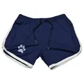 Detailed macro view of navy blue mesh sports shorts featuring white trim and a cute paw print - M / Bottoms / Navy Blue With White Edge
