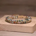 Detail view of handmade double-layer woven yoga bracelet with multi-color natural stones - Multicolor Braided Natural Stone
