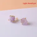 Irregular raw light amethyst crystal stud earrings with gold-plated four-prong setting - Light Amethyst