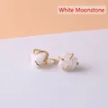 Irregular raw white moonstone stud earrings with gold-plated four-prong setting - White Moonstone