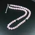 Handgemaakte ketting van roze rozenkwarts met zilveren bloemen accenten voor dames - Roze Kralenketting / Rozenkwarts