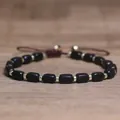 Handmade adjustable natural stone beaded bracelet with black beads and gold-tone spacers - Black Agate