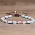 Handmade natural stone bracelet with rectangular blue beads and gold spacers on brown cord - Shoushan Stone