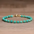 Handgemaakte armband van turquoise natuursteen met gouden tussenkralen voor dames - Turkoois / 4*6mm