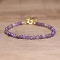 Detailed view of faceted purple natural stone beads on a handmade adjustable bracelet. - Purple Crystal
