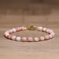 Handmade pink natural stone beaded bracelet featuring 4x6mm crystals and gold-plated beads. - Pink Opal / 4*6mm