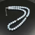 Collar de cuentas de piedra natural azul claro con detalles de plata envejecida. - Aguamarina