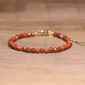 Handgemaakte Boheemse armband van gefacetteerde natuursteen met verstelbare gouden ketting - Rode Jaspis