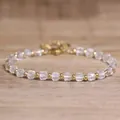 Handmade 4x6mm natural crystal beaded bracelet with gold-toned spacers on wood - White Crystal / 4*6mm