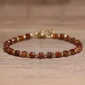 Handmade natural stone beaded bracelet with golden cubic orange crystals - Orange Garnet / 4*6mm