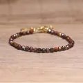 Faceted natural stone handmade beaded adjustable bracelet with bohemian style and gold accents - Red Tiger Eye