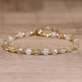 Handcrafted 4x6mm natural stone crystal beaded bracelet with faceted yellow and white stones. - Citrine / 4*6mm