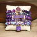 Close-up detail of 5-piece bohemian purple amethyst and natural stone bracelet set - 5 Pieces / Purple