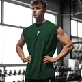 Canotta fitness verde scuro senza maniche in tessuto mesh traspirante per uomo palestra - Taglia S / Top / Verde Scuro