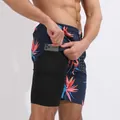 Gros plan sur la poche de téléphone intégrée au short de bain imprimé pour homme - S / Bas / 11# Imprimé Cactus de Noël