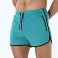 Pantalones cortos deportivos turquesas de secado rápido para hombre con cremallera - Verde