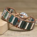 Detailed macro view of a vintage handmade green stone tube bead wrap bracelet - India Agate