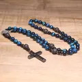 Close-up detail of natural blue tiger eye beads and lava stone rosary with black cross - Blue Tiger Eye