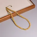 Collana bohémien fatta a mano con perline in pietra naturale e catena regolabile - Venatura Legno Giallo