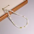 Squisita collana bohémien fatta a mano in pietra naturale acquamarina con perline dorate - Cristallo di rocca