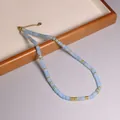 Collana fatta a mano in acquamarina con accenti dorati e chiusura regolabile da donna - Acquamarina
