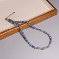 Collana fatta a mano in pietra naturale blu con distanziatori dorati regolabili per donna - Pietra a Macchie Blu